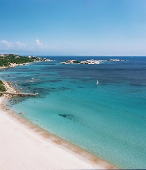 Private beach, white sand, free beach shuttle, sun loungers