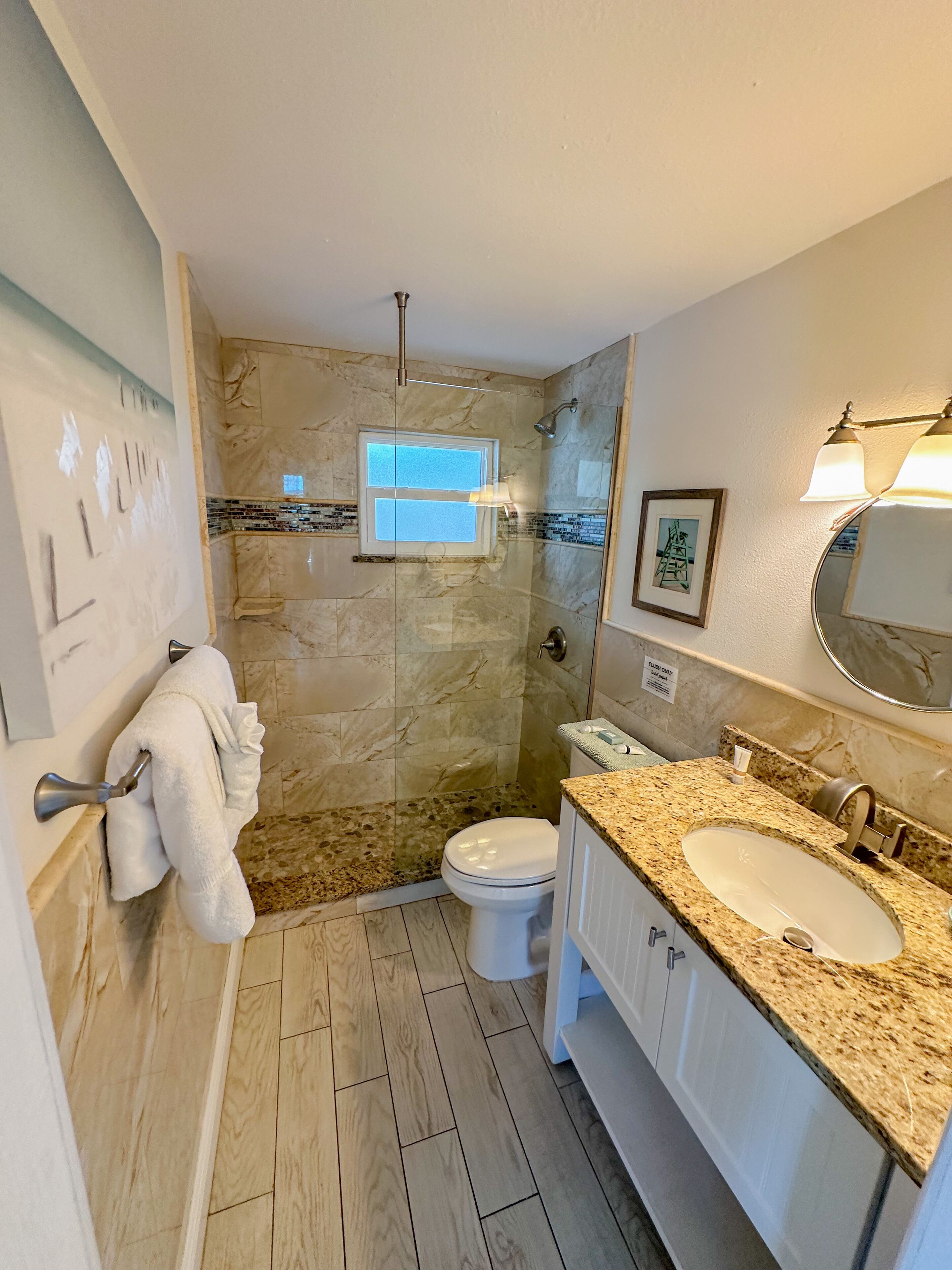 deluxe suite, 1 king bed, no pets allowed | bathroom | designer toiletries, hair dryer, towels, soap