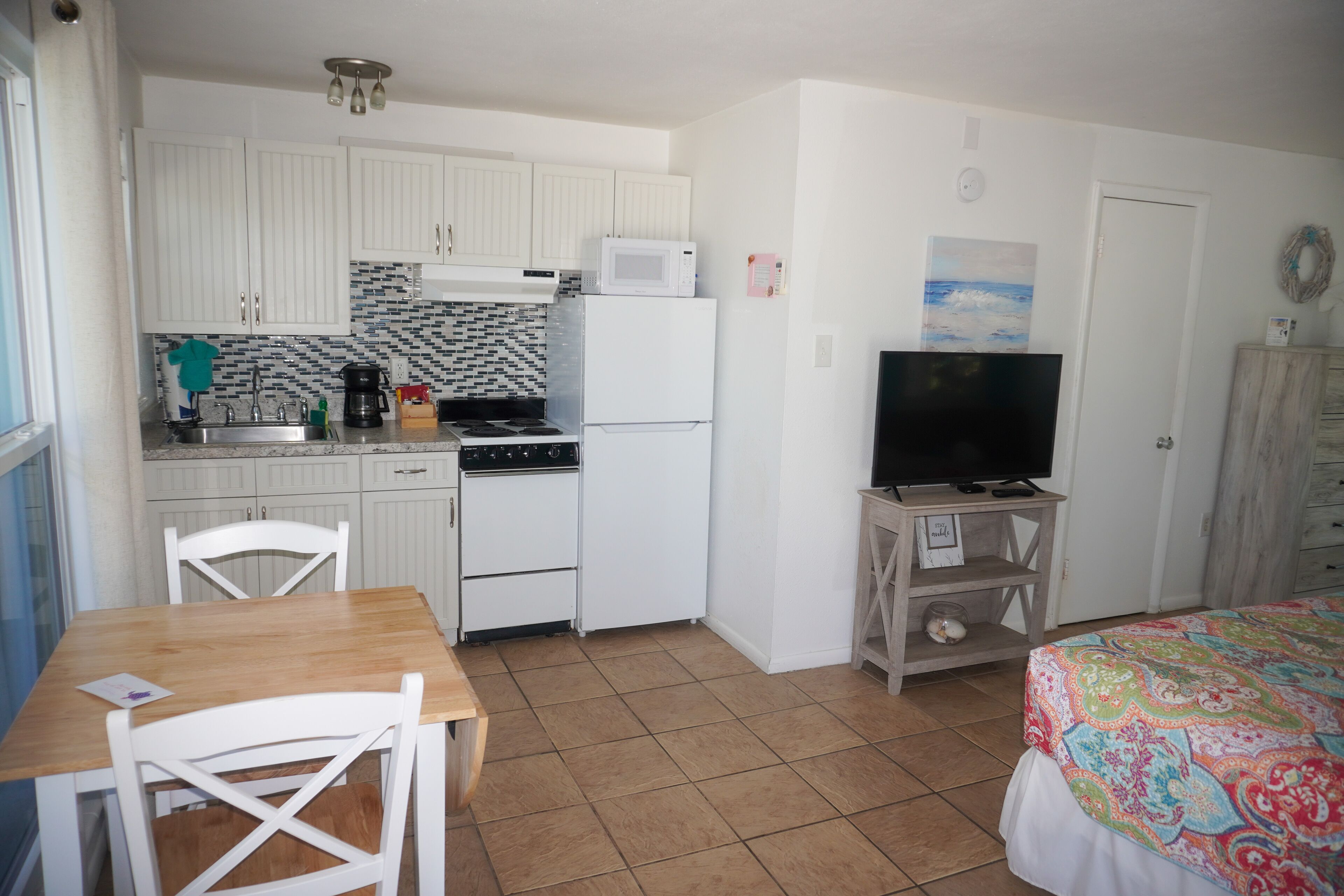 king waterview with private balcony, no pets allowed | individually decorated, individually furnished, iron/ironing board