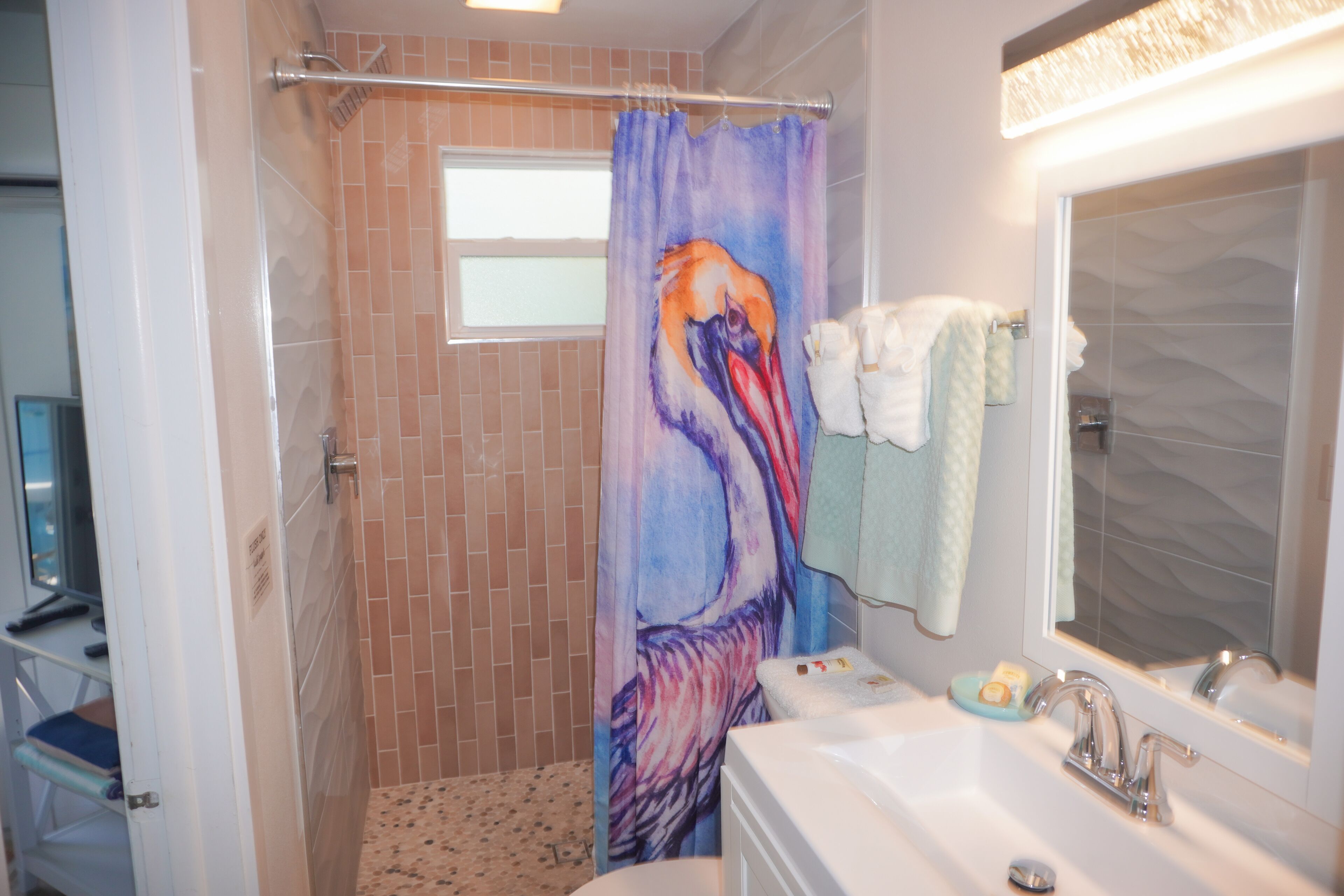 queen water view efficiency, no pets allowed | bathroom | designer toiletries, hair dryer, towels, soap