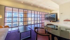 Junior Suite (Premium Level) | Living area | Flat-screen TV, streaming services