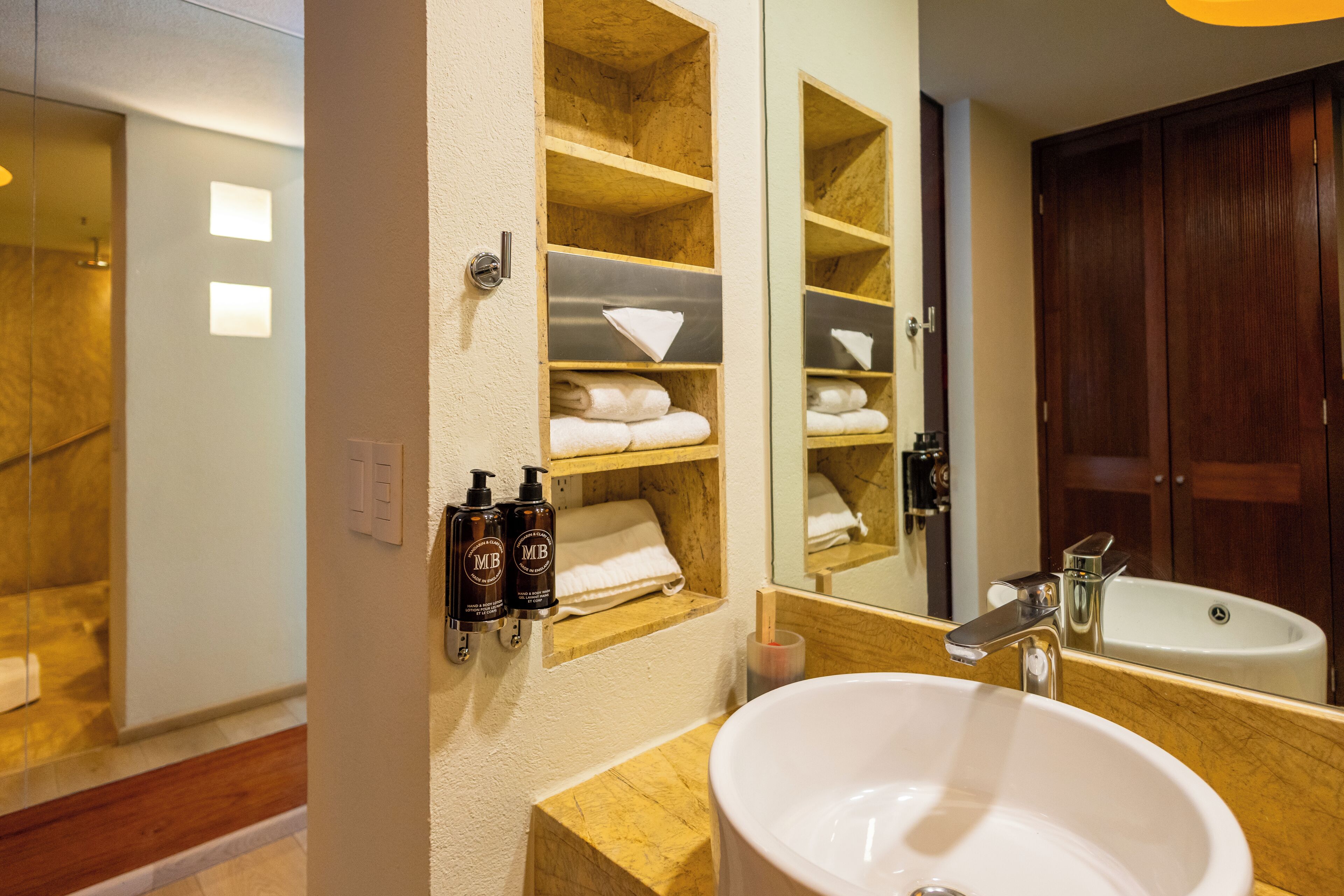 designer toiletries, hair dryer, slippers, heated floors