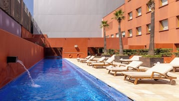 Outdoor pool, open 8:00 AM to 8:00 PM, sun loungers