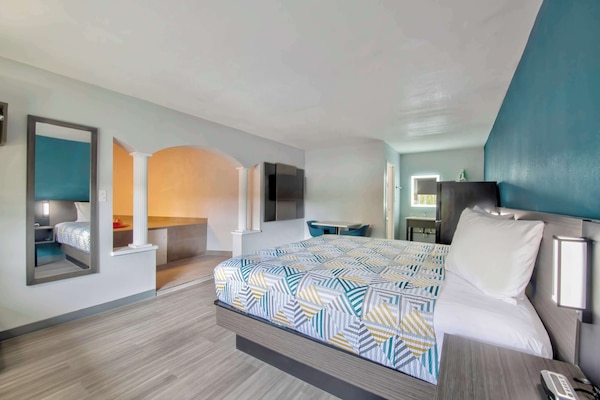 Desk, blackout drapes, WiFi (free), bed sheets