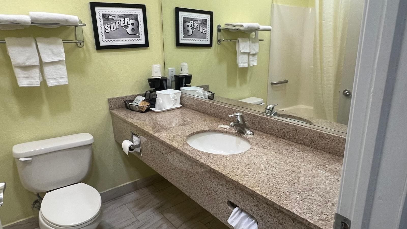 Combined shower/bathtub, hair dryer, towels