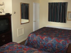 Standard Room, 2 Queen Beds | Iron/ironing board, free WiFi, bed sheets