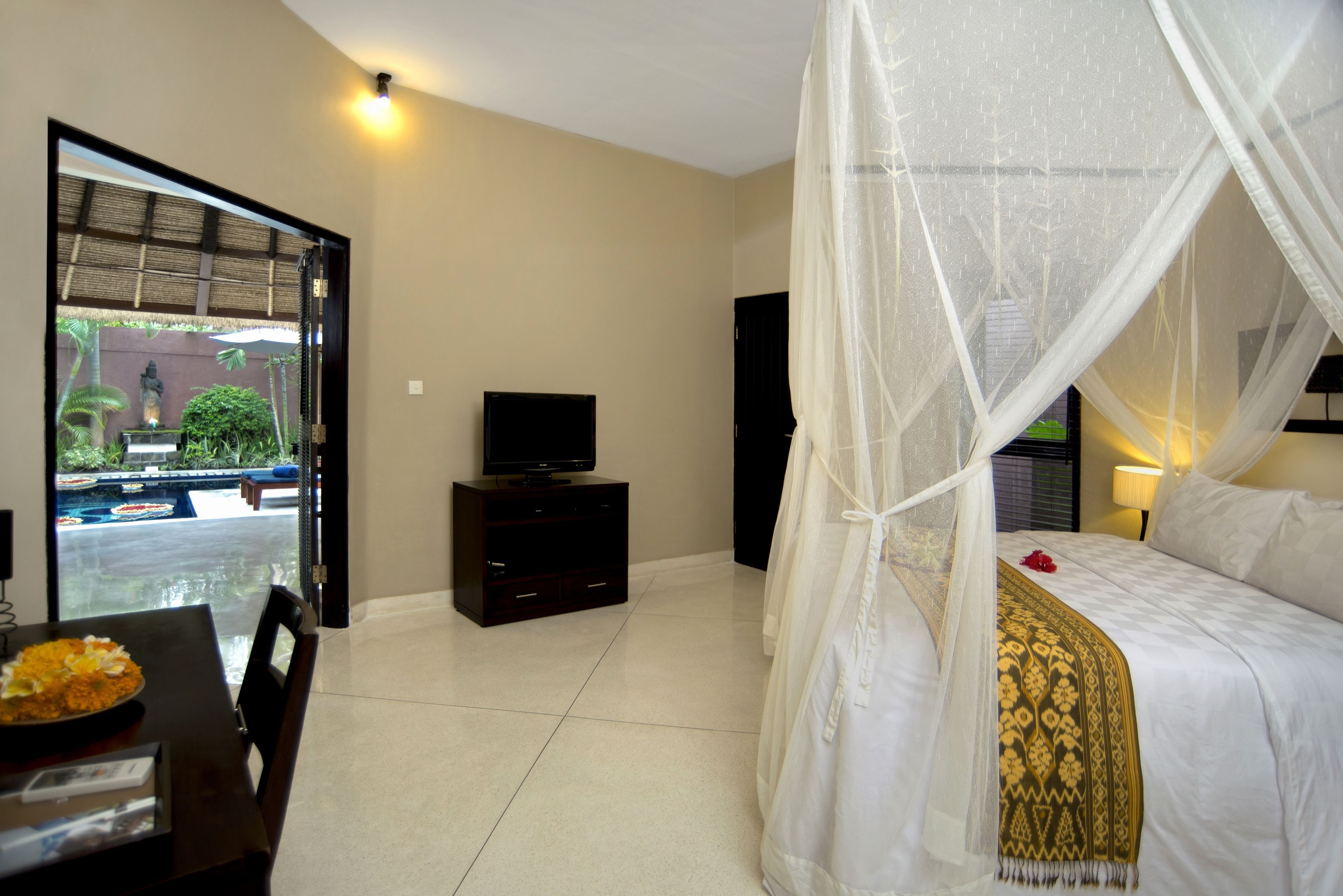 villa, 1 bedroom, private pool | minibar, in-room safe, desk, iron/ironing board
