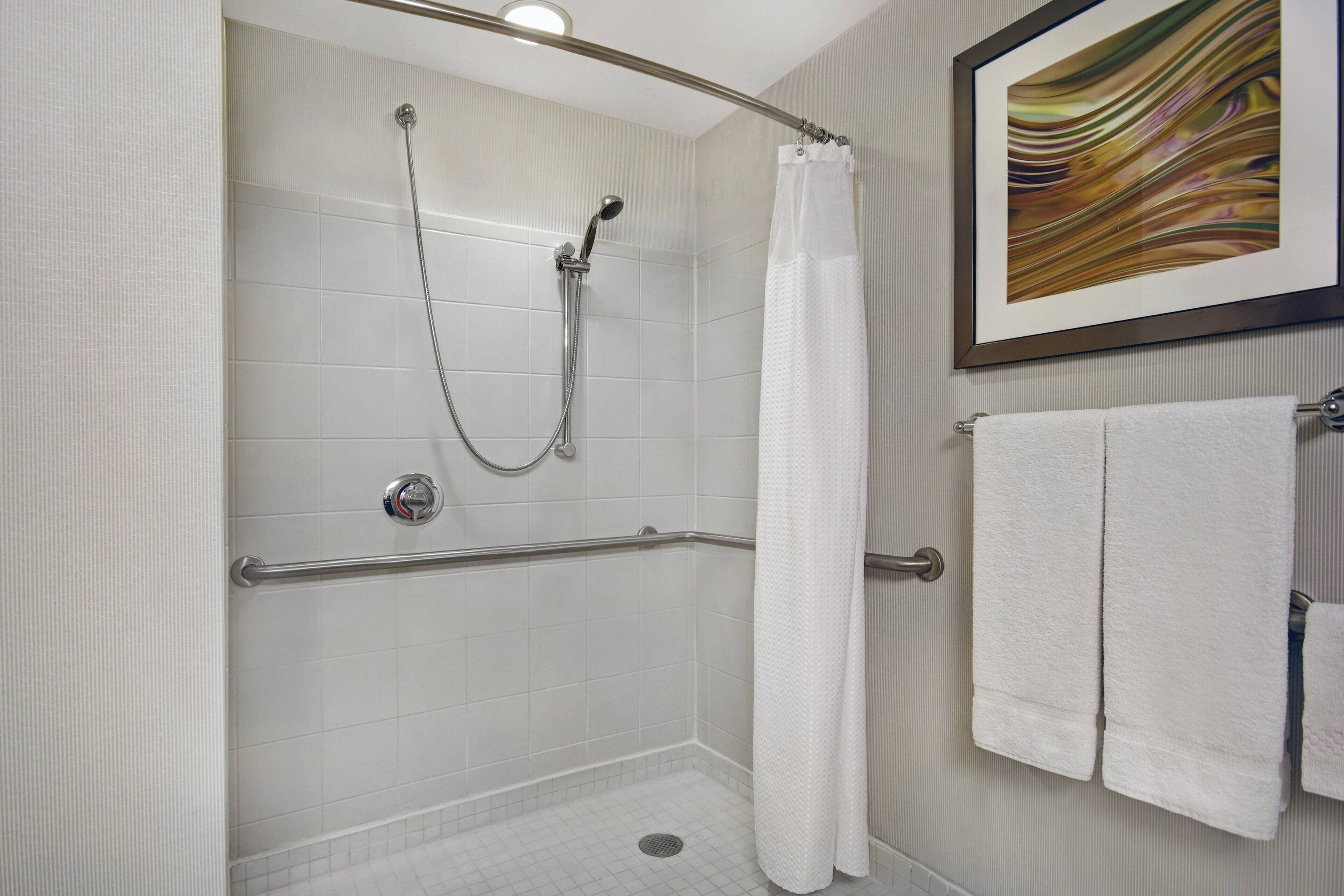 combined shower/bathtub, free toiletries, hair dryer, towels