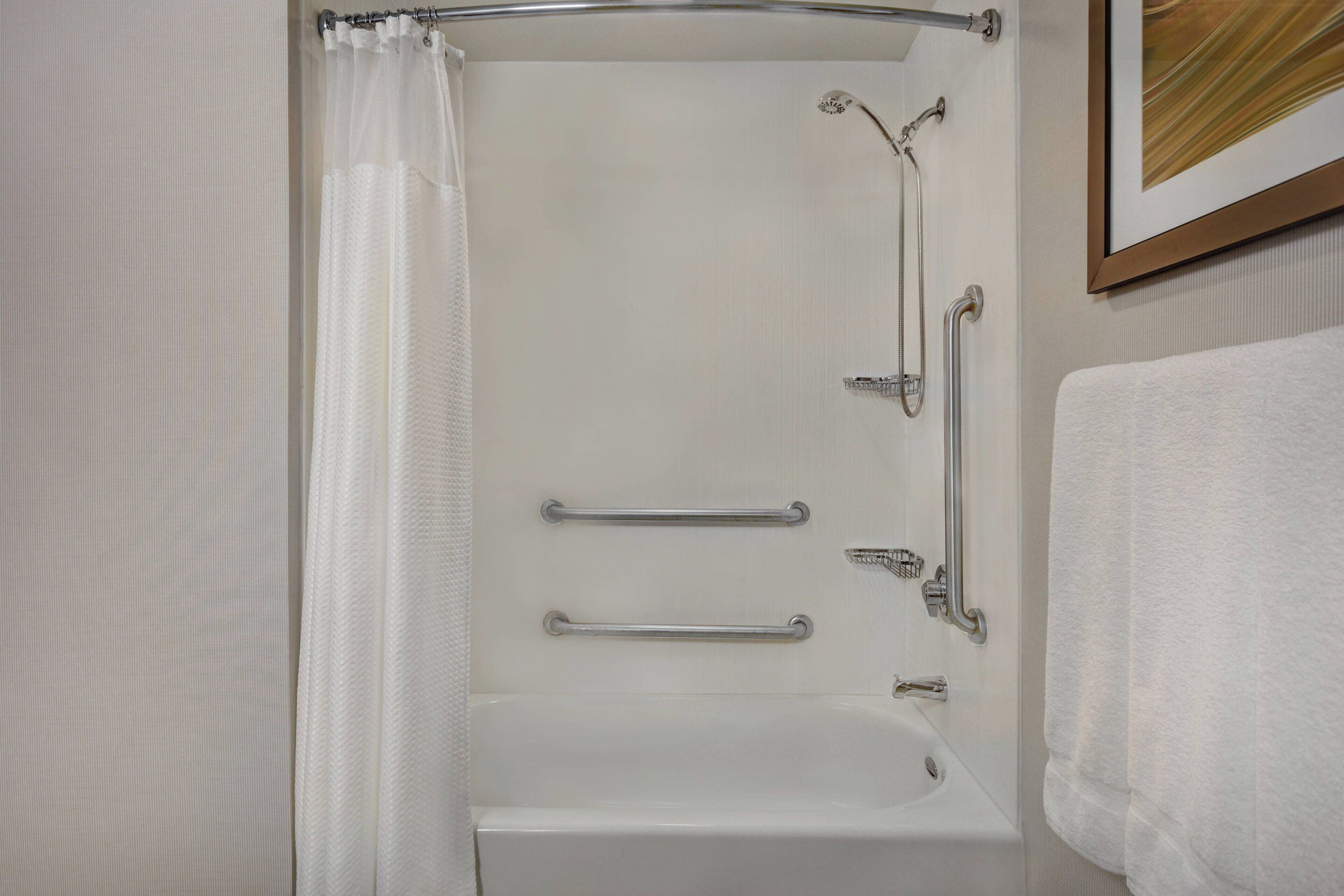 combined shower/bathtub, free toiletries, hair dryer, towels