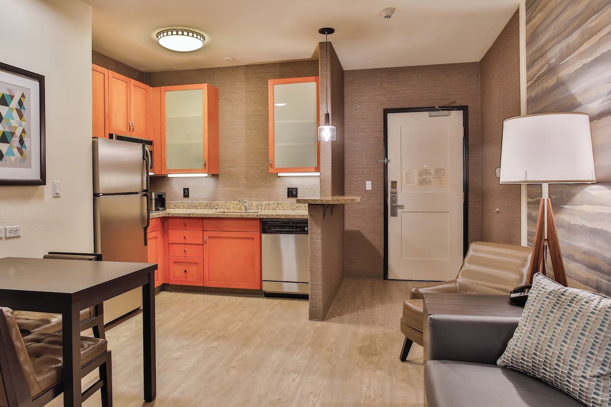 full-sized fridge, microwave, stovetop, dishwasher