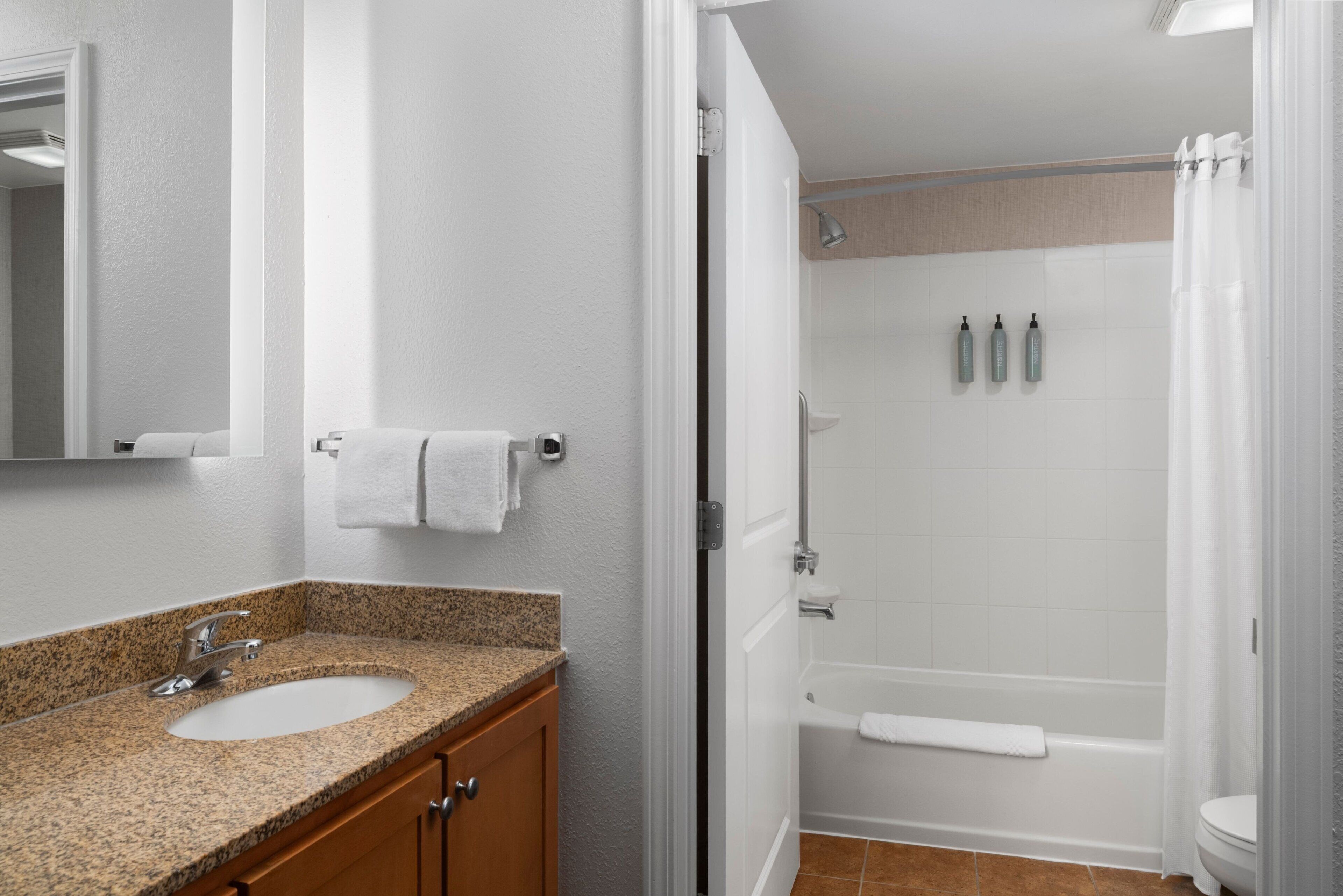 combined shower/bathtub, free toiletries, hair dryer, towels