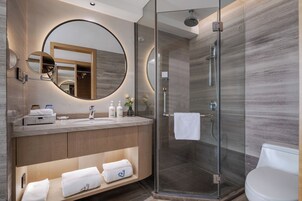 Hair dryer, bathrobes, slippers, towels