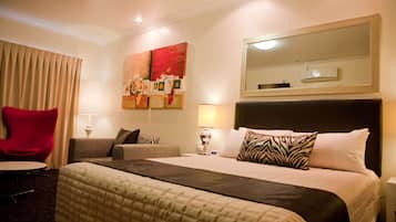 Premium bedding, pillow-top beds, minibar, desk
