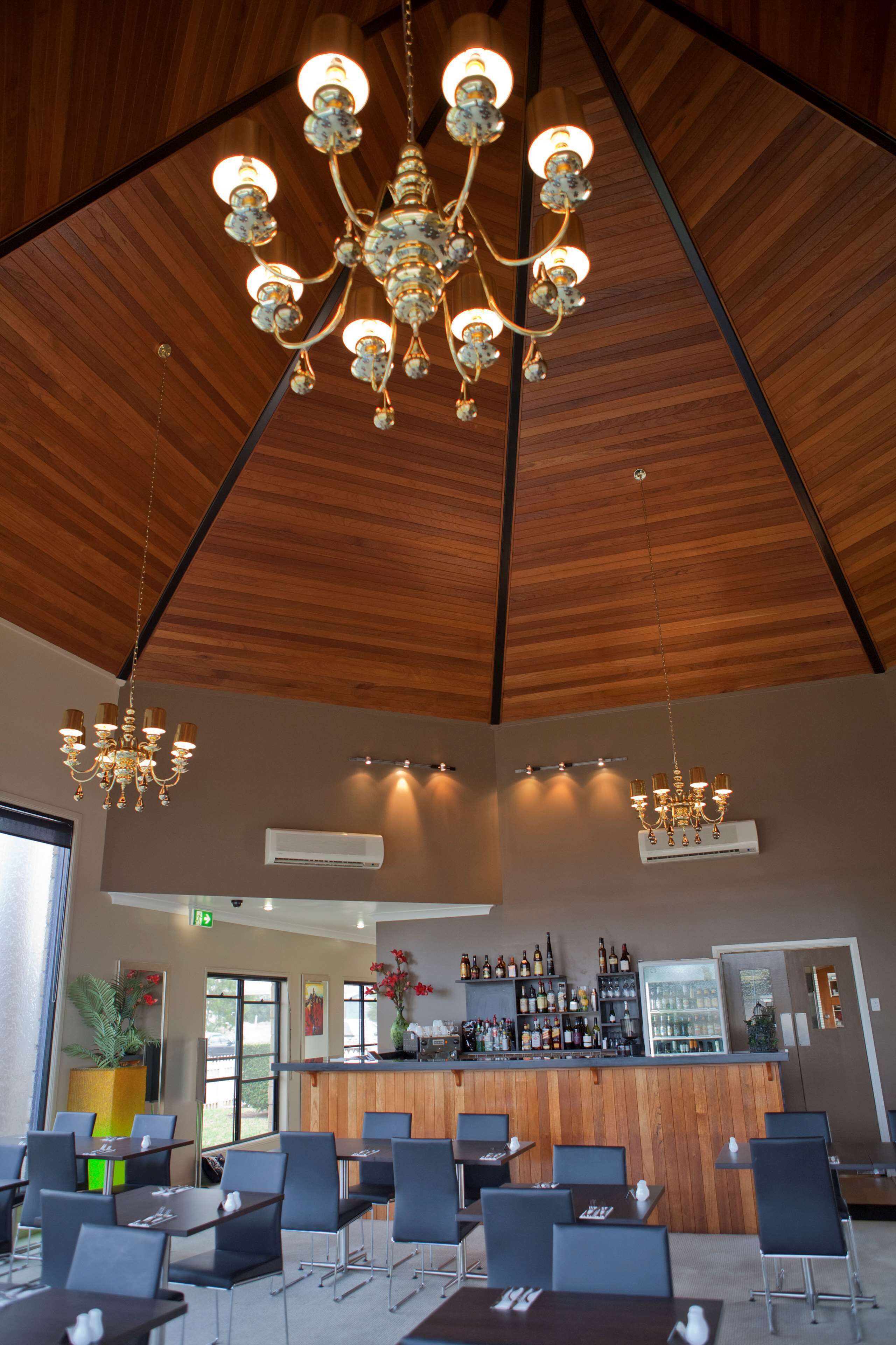 Breakfast, dinner served; international cuisine, pool views 