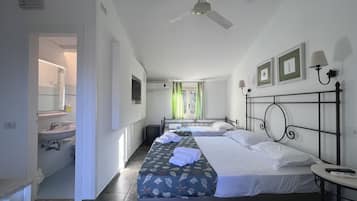 Minibar, rideaux occultants, draps fournis