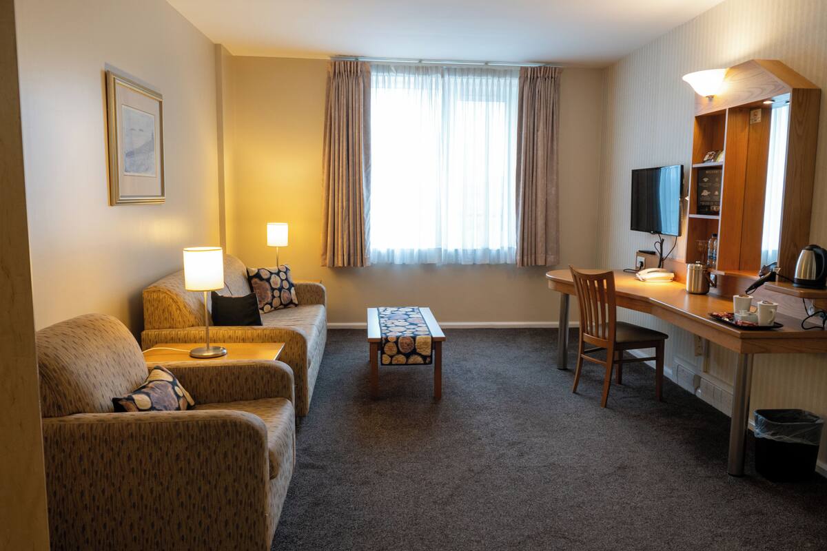 suite, multiple beds | in-room safe, desk, iron/ironing board, free cots/infant beds