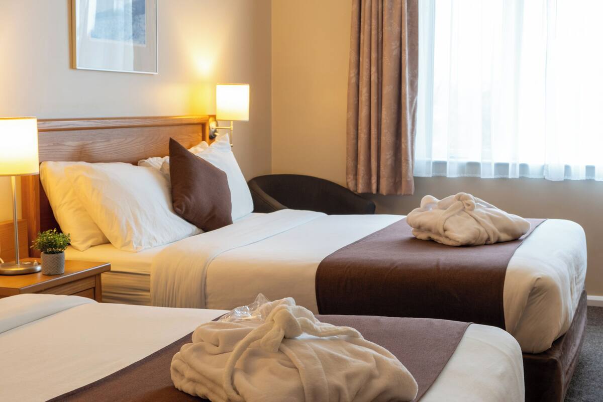 twin room, 2 queen beds | in-room safe, desk, iron/ironing board, free cots/infant beds