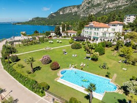 Seasonal outdoor pool, pool umbrellas, sun loungers