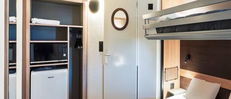 Premium bedding, desk, blackout curtains, iron/ironing board