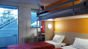 A hotel room with two beds, a bunk bed, a window with a view of a staircase, and a round wall light. - Premiere Classe Saumur (Saumur)