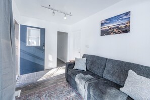 Suite, 2 Bedrooms (Up to 8pax) | Living area | 23-inch flat-screen TV with cable channels, TV