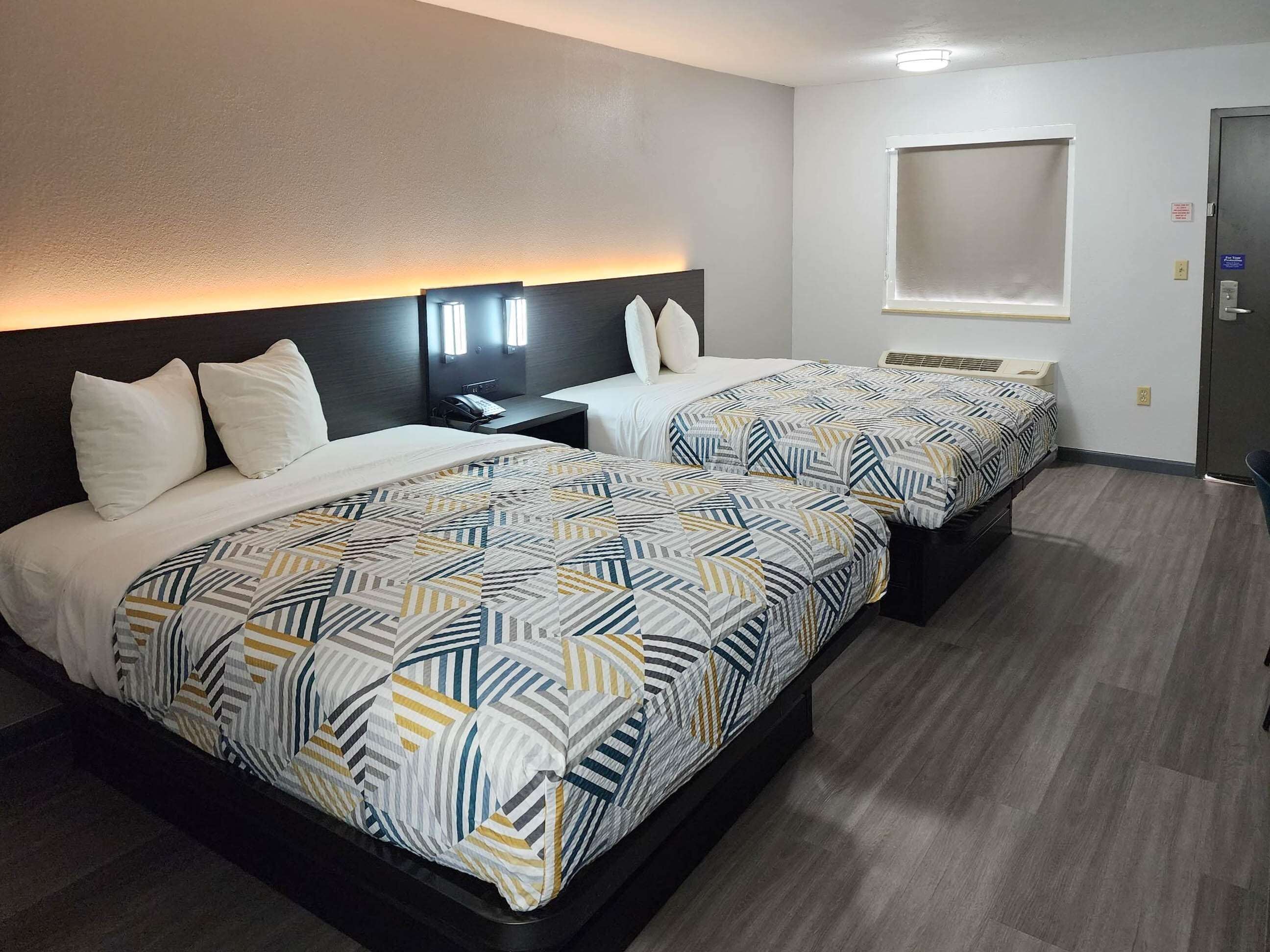 Wi-Fi de cortesia, roupa de cama, despertadores