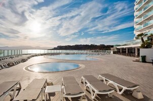 2 outdoor pools, pool umbrellas, sun loungers