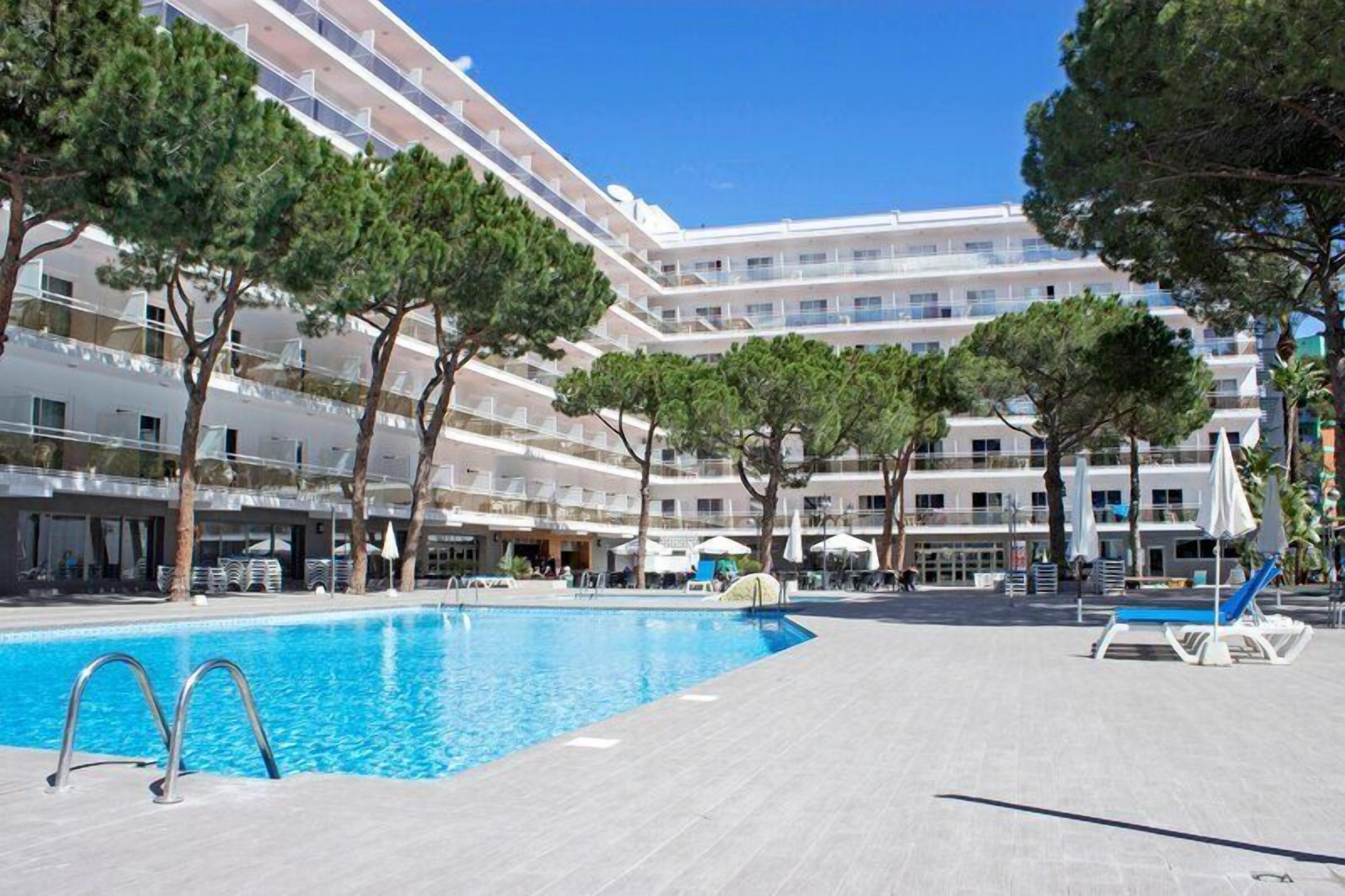 Indoor pool, outdoor pool, pool umbrellas, sun loungers