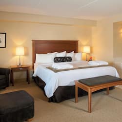 Premium bedding, pillow-top beds, desk, laptop workspace
