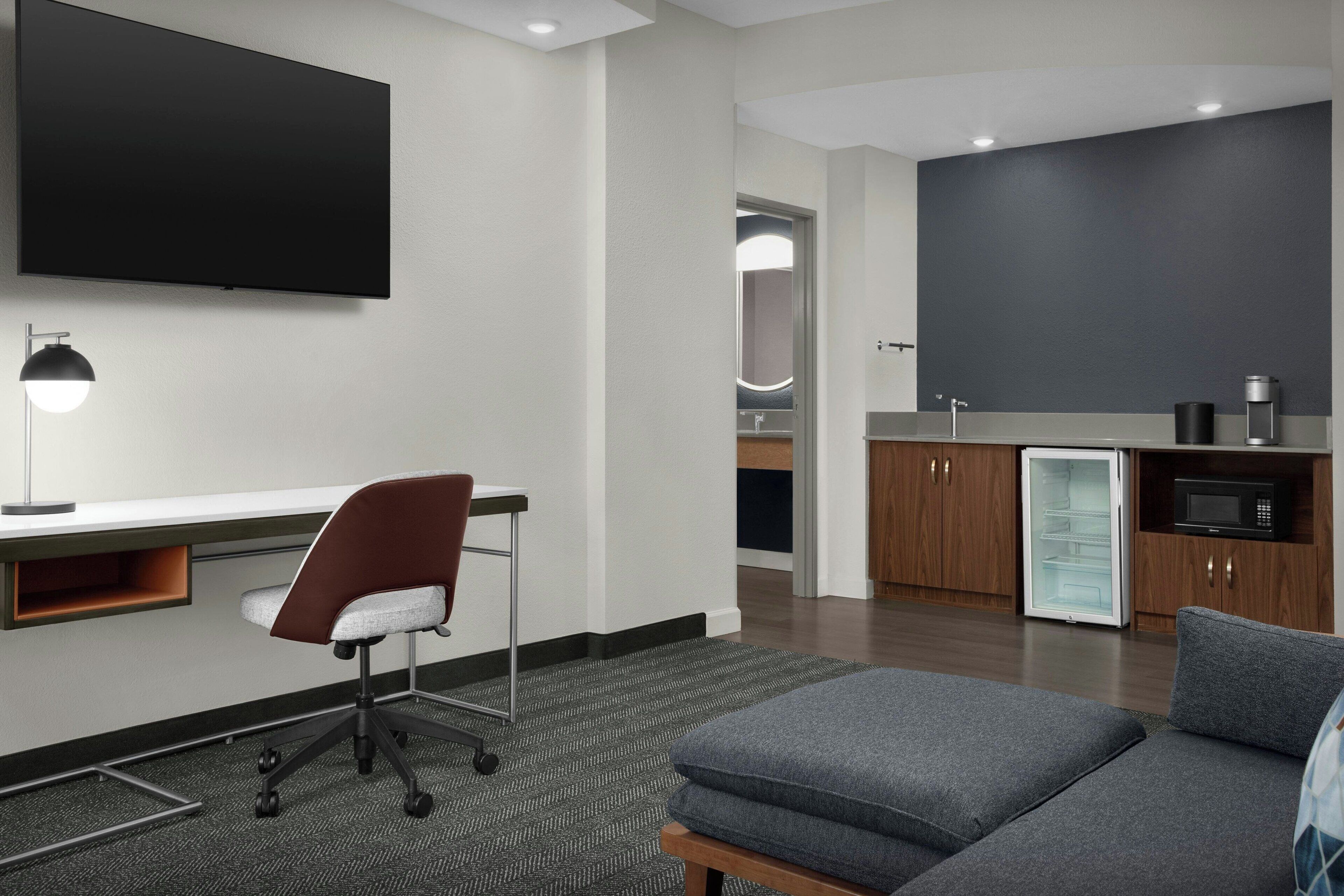 hypo-allergenic bedding, down duvets, desk, blackout curtains