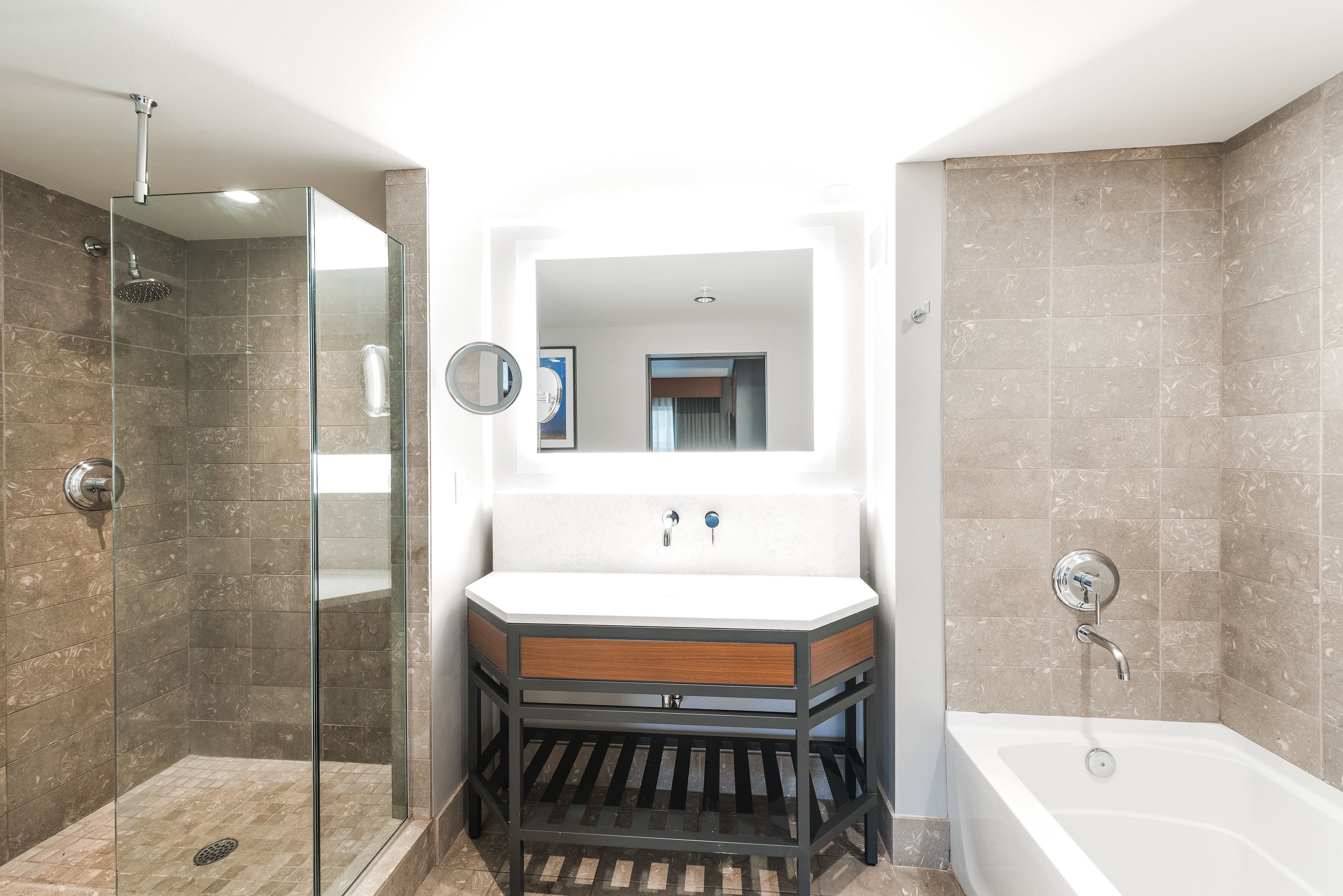 combined shower/bathtub, designer toiletries, hair dryer, bathrobes