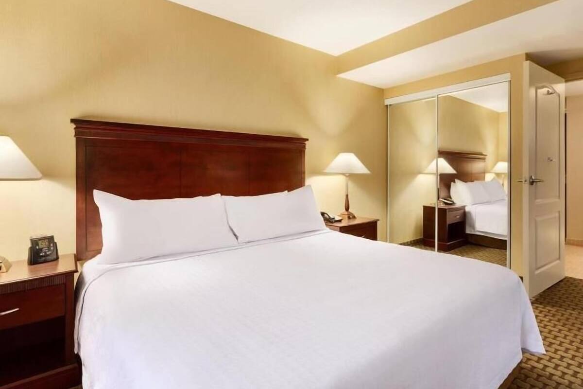 Hypo-allergenic bedding, pillow-top beds, in-room safe, desk