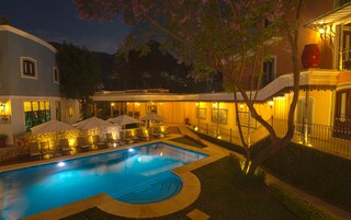 Indoor pool, outdoor pool, open 9 AM to 8 PM, pool umbrellas
