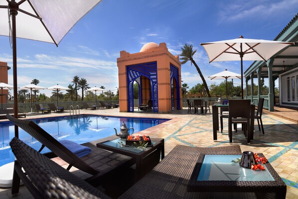 Outdoor pool, pool umbrellas, pool loungers