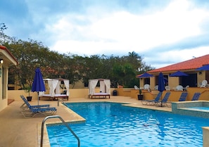 2 outdoor pools, pool umbrellas, pool loungers