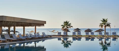 Indoor pool, 3 outdoor pools, pool cabanas (surcharge), pool umbrellas