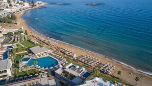 A resort with a pool, beach, and ocean views. - Atlantica Kalliston Resort - Adults Only (Chania)