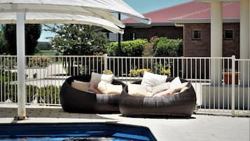 Outdoor pool, pool umbrellas, pool loungers
