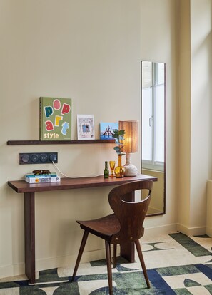 Premium bedding, desk, laptop workspace, blackout curtains