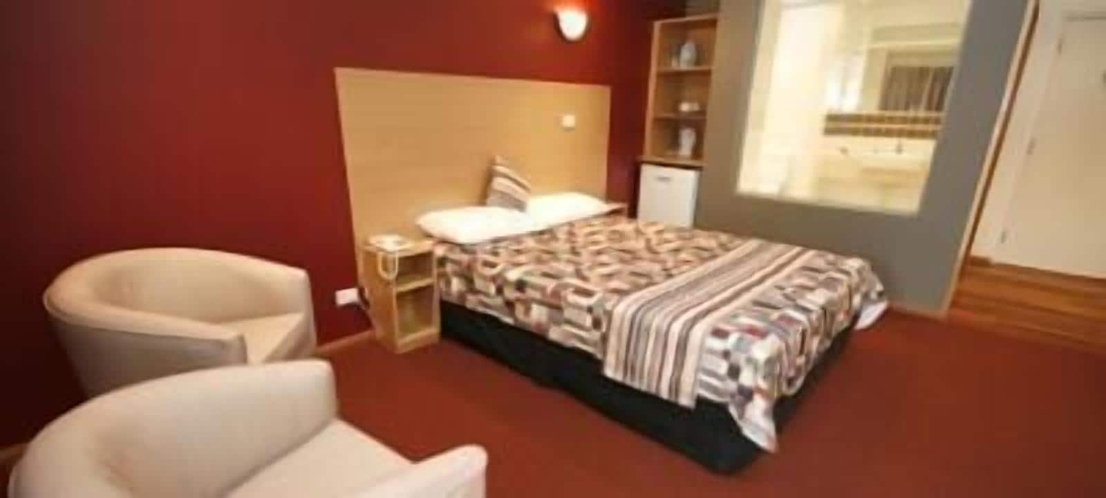 deluxe room | desk, laptop workspace, blackout curtains, soundproofing