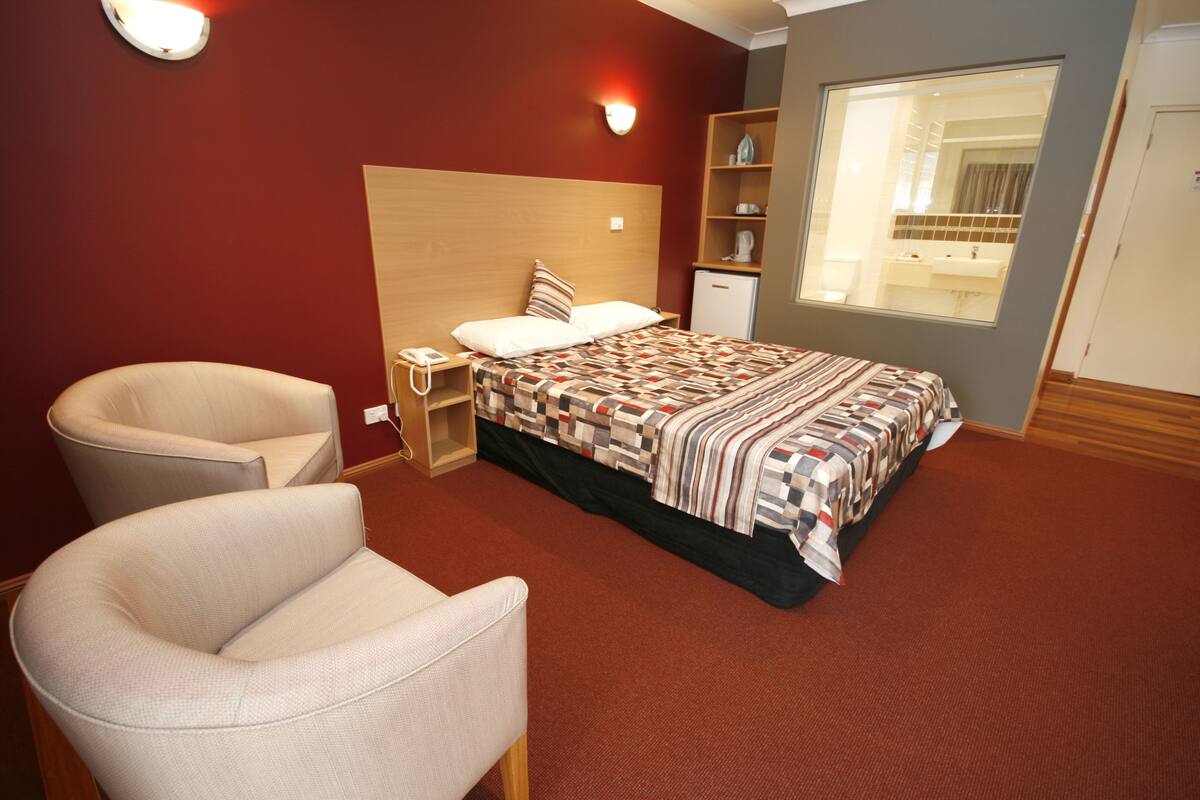 deluxe room | desk, laptop workspace, blackout curtains, soundproofing