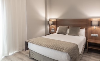 Escritorio, sistema de insonorización, cunas gratuitas y wifi gratis