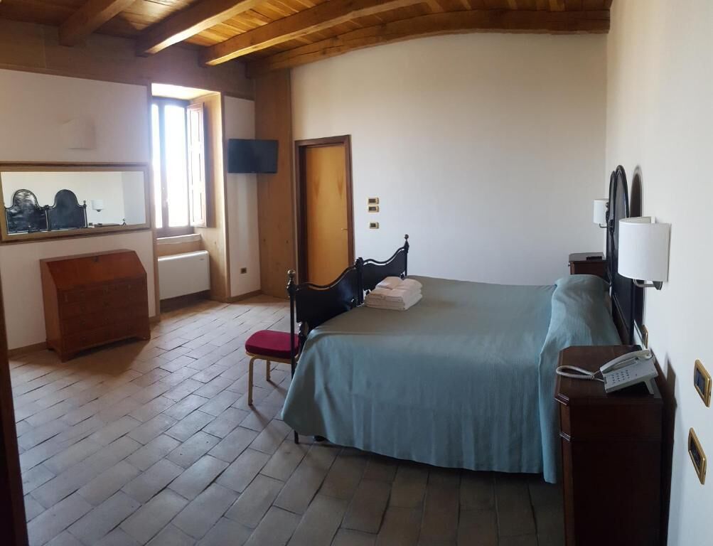 Comfort Triple Room | Minibar, in-room safe, individually decorated, desk