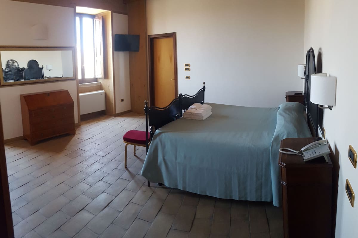Junior Double Room, City View | Hypo-allergenic bedding available, pillowtop beds, in-room safe, desk