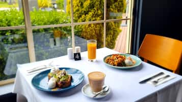 Daily buffet breakfast (AUD 30 per person)