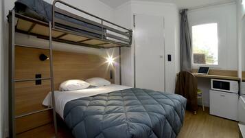 Standard Room, Multiple Beds (1 Double and 1 Single bed) | Desk, laptop workspace, blackout drapes, iron/ironing board