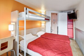 A hotel room with a bunk bed, a desk with a chair, a bedside table, a red bedspread, a wall-mounted TV, and a wardrobe. - Premiere Classe Bordeaux Sud-Pessac Becquerel (Pessac)