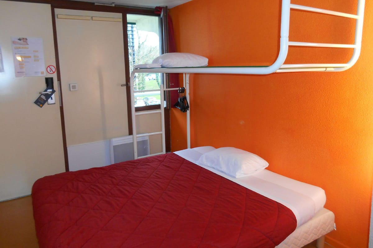 Premium bedding, desk, blackout drapes, iron/ironing board