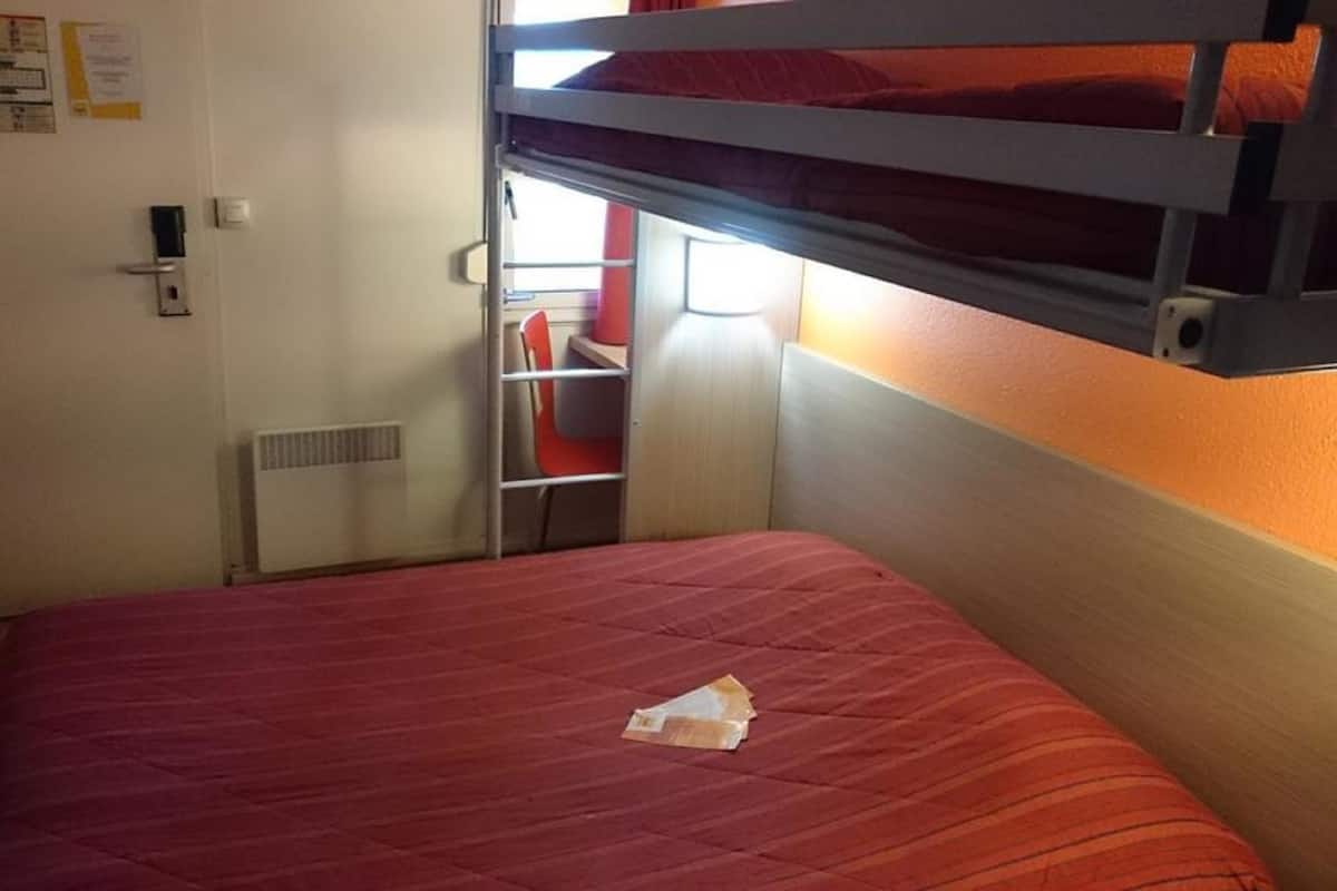 Desk, blackout curtains, free WiFi, bed sheets