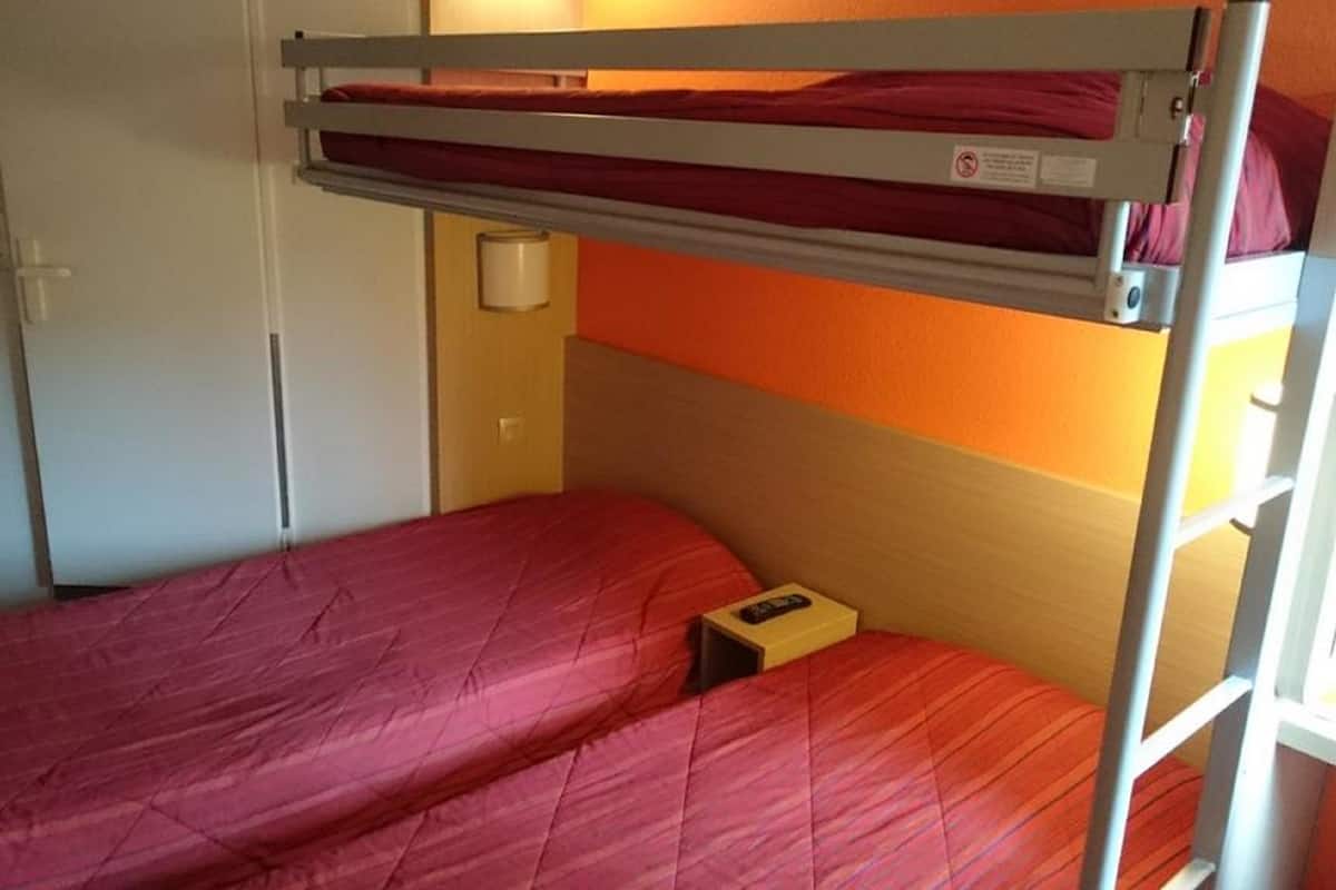 Desk, blackout curtains, free WiFi, bed sheets